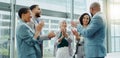 Happy business people, meeting and applause in teamwork for promotion, winning or success at office. Group of employees Royalty Free Stock Photo