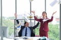 Happy business people team celebrating successful throwing papers in meeting room at office . teamwork winning . victory concept Royalty Free Stock Photo