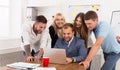 Happy business people team together look at laptop in office Royalty Free Stock Photo