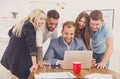 Happy business people team together near laptop in office Royalty Free Stock Photo