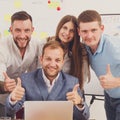 Happy business people team together near laptop in office Royalty Free Stock Photo