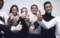 Happy, business people and thumbs up for winning, success or team approval together at office. Group of employee workers Royalty Free Stock Photo