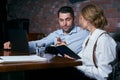 Happy business people working together on laptop in a restaurant Royalty Free Stock Photo