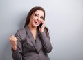 Happy business successful excited woman talking on mobile phone Royalty Free Stock Photo