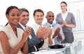 Happy business team applauding a good presentation Royalty Free Stock Photo