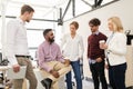 Happy business team drinking coffee at office Royalty Free Stock Photo