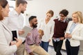 Happy business team drinking coffee at office Royalty Free Stock Photo