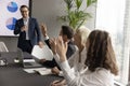 Happy business team having questions to presenter, rising hands Royalty Free Stock Photo