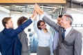 Happy business team high fiving Royalty Free Stock Photo