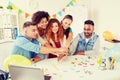 Happy business team at office party holding hands Royalty Free Stock Photo