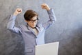 Happy business teen boy with laptop Royalty Free Stock Photo