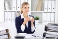 Happy business woman or female accountant having some minutes for time off and pleasure at working place. Audit and tax Royalty Free Stock Photo