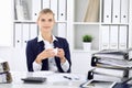 Happy business woman or female accountant having some minutes for time off and pleasure at working place. Audit and tax Royalty Free Stock Photo