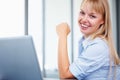 Happy business woman with laptop. Closeup portrait of beautiful young business woman with laptop. Royalty Free Stock Photo