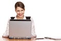 Happy business woman in office works on laptop Royalty Free Stock Photo