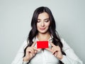 Happy business woman with red empty card. Young woman smiling Royalty Free Stock Photo