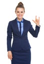 Happy business woman showing l love you gesture Royalty Free Stock Photo