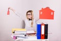 Happy business woman in office holding house Royalty Free Stock Photo