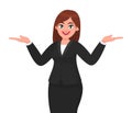 Happy business woman spreading hands to copy space away. Business woman presenting or introducing something.