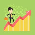 Happy business woman standing on profit chart. Royalty Free Stock Photo