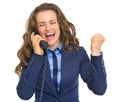 Happy business woman talking phone and rejoicing Royalty Free Stock Photo