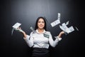 Happy business woman under a money rain made of dollars isolated on black Royalty Free Stock Photo