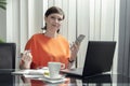 Happy business woman working with her mobile phone and laptop in the office. Successful business, People smiling Royalty Free Stock Photo