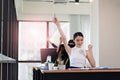 Happy business woman working in the office with your hands up Royalty Free Stock Photo