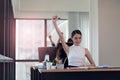 Happy business woman working in the office with your hands up Royalty Free Stock Photo