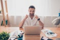 Happy businessman achiving his goal and showing fists Royalty Free Stock Photo