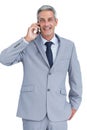 Happy businessman answering phone Royalty Free Stock Photo