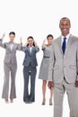 Happy businessman with approving co-workers Royalty Free Stock Photo