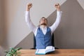 Happy businessman beard man in suit looking smiling excited with good news