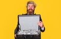 Happy businessman with briefcase full of money. Bearded man with case of dollars. Lending service. Royalty Free Stock Photo