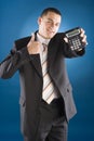 Happy businessman with calculator in his hand Royalty Free Stock Photo