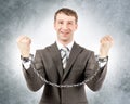 Happy businessman in cuffs Royalty Free Stock Photo