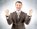 Happy businessman in cuffs Royalty Free Stock Photo