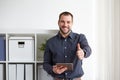 Happy businessman with digital tablet Royalty Free Stock Photo