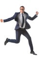 happy businessman in eyeglasses jumping and gesturing by hands Royalty Free Stock Photo