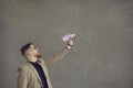 Happy businessman flying paper plane as metaphor for aiming for business success Royalty Free Stock Photo