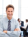 Happy businessman in front of his teamwork Royalty Free Stock Photo