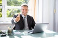 Happy Businessman Gesturing Thumbs Up Royalty Free Stock Photo