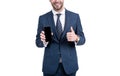 Happy businessman half face give thumbs up to approved mobile phone model, approval