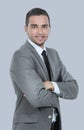 Young successful businessman smiling over graÃÆy background. Royalty Free Stock Photo