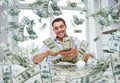 Happy businessman with heap of money Royalty Free Stock Photo