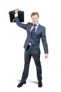 Happy businessman holding brief case Royalty Free Stock Photo