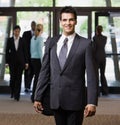 Happy businessman holding briefcase Royalty Free Stock Photo