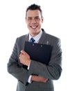 Happy businessman holding a clipboard Royalty Free Stock Photo