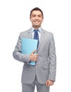 Happy businessman holding folder Royalty Free Stock Photo