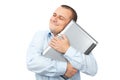 Happy businessman holding his laptop Royalty Free Stock Photo